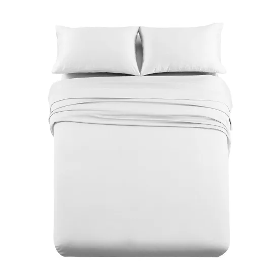 A white 1000 thread count sheet set made up on a bed, two pillows and the flat sheet folded over, photographed from above on a white background