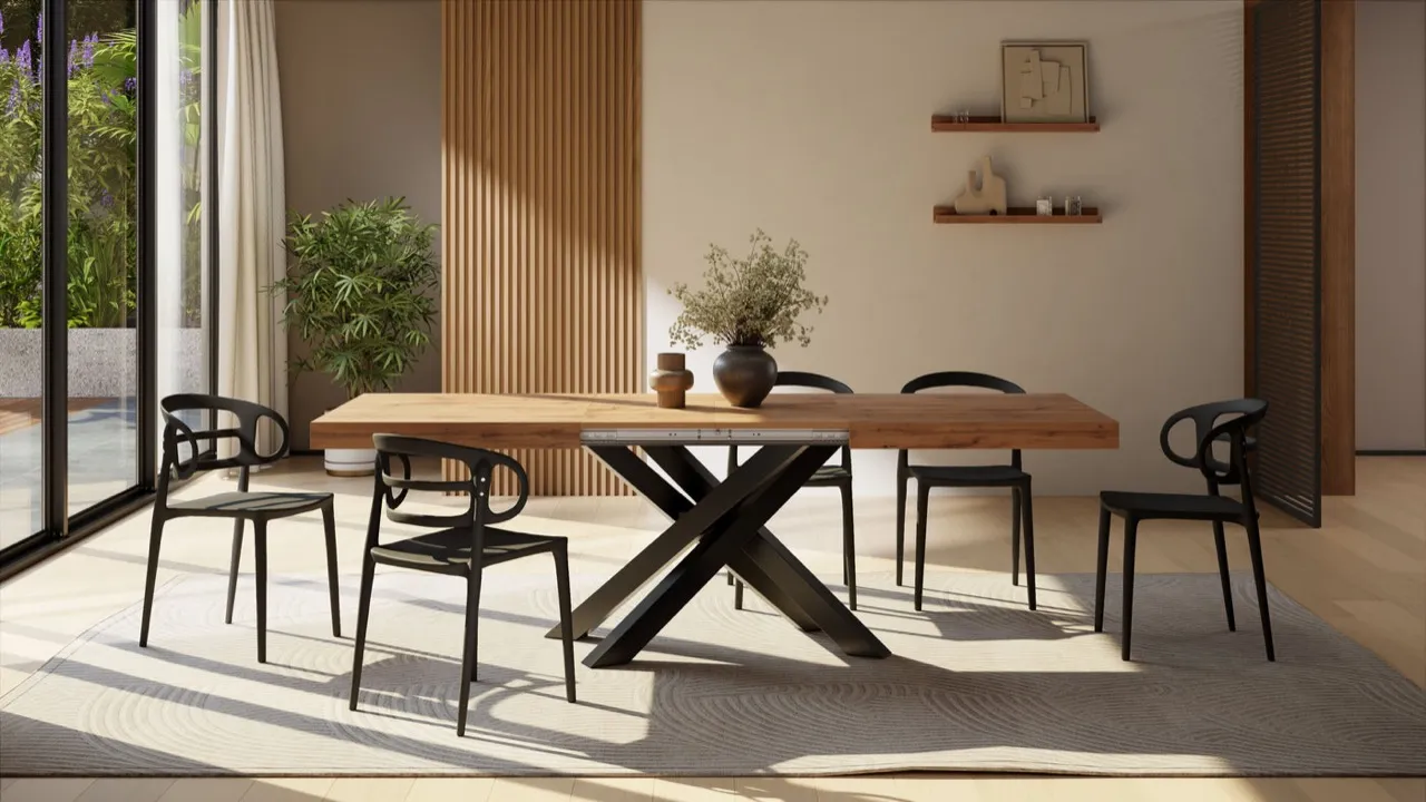 Table Emma dans une salle &agrave; manger claire avec six chaises noires