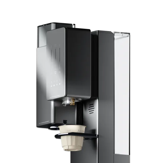 The head of the xBloom Original in Galaxy Black: the glossy touch panel, the gold pour spout, a cream xPod on the dock and the clear water tank at the side